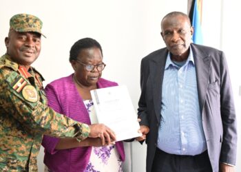 Col. Rukogota, Mrs. Okalany and Haji Kakande