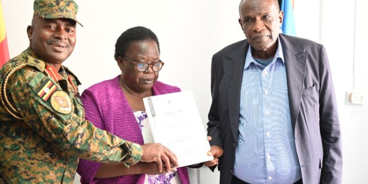 Col. Rukogota, Mrs. Okalany and Haji Kakande