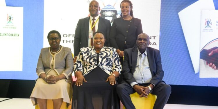Seated, left to right: The Deputy Head of Public Service and Deputy Secretary to the Cabinet, Dr. Theopista Mary Wenene,  Hon. Babalanda and Haji Kakande