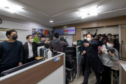 Then–Gyeonggi Province Governor Lee Jae-myung oversees a 2020 raid on Shincheonji Church of Jesus facilities