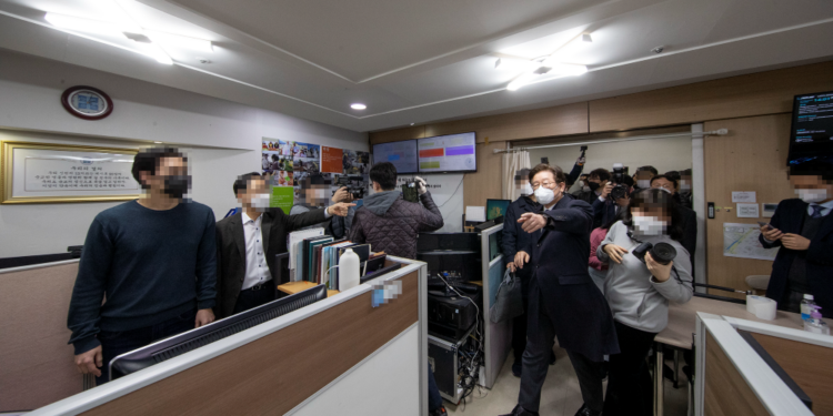 Then–Gyeonggi Province Governor Lee Jae-myung oversees a 2020 raid on Shincheonji Church of Jesus facilities