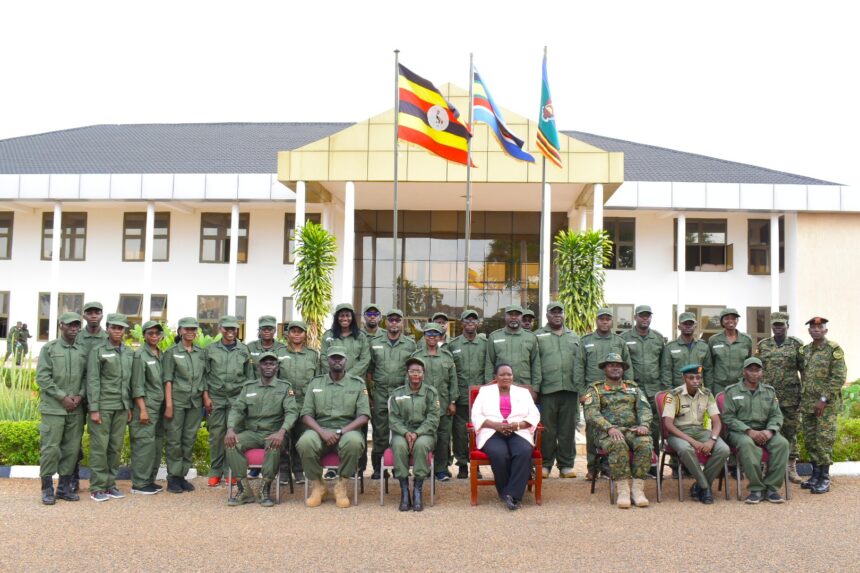 Prime Minister Rt Hon Robinah Nabbanja poses for a photo with a section of the first cohort of UDB staff
